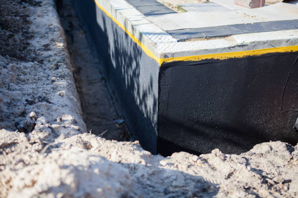 Professional Basement Waterproofing technician working in Seneca Falls, NY